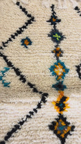 Load and play video in Gallery viewer, Rafika Handwoven Moroccan Wool Rug 5x8
